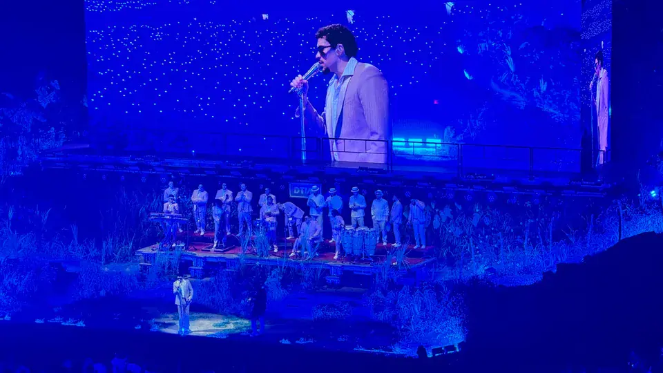 A blue-lit stage and giant screen during Bad Bunny’s Puerto Rico residency