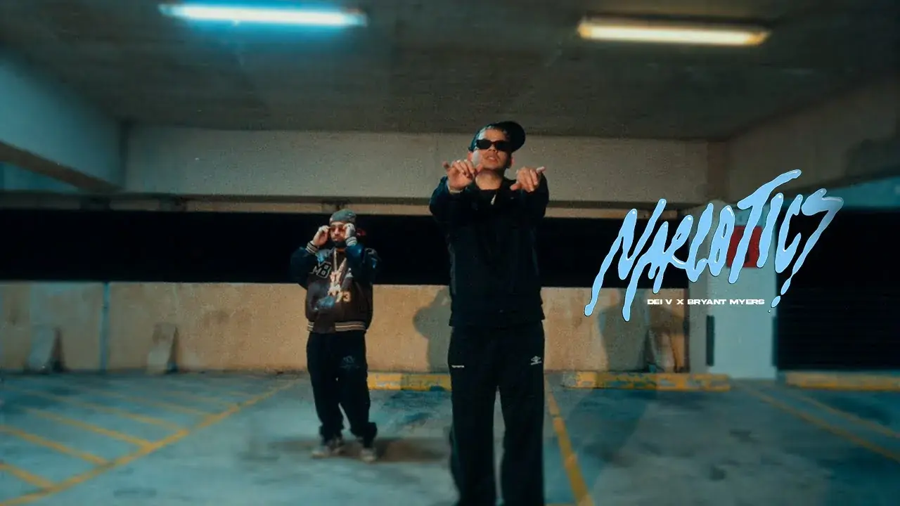 Dei V and Bryant Myers in a parking garage beside the N@RCOTICS title