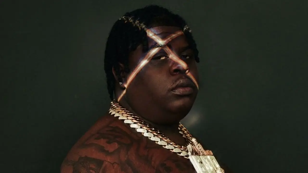 Official music-video thumbnail: Blazer Got The Juice’s tag, voiced by Sara Cajner, on BigXthaPlug’s “Texas”